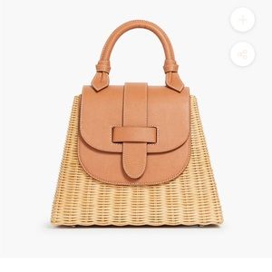 Brand new, never used Pamela Munson Straw and Leather Lady bag.